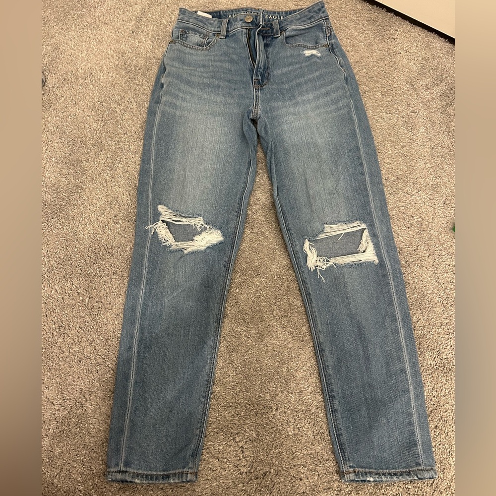 American Eagle Light Wash Blue lightly ripped jeans
